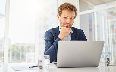 Image showing Thinking, laptop and business man in office for focus, research and planning. Communication, technology and internet with male employee contemplating for website, project idea and connection