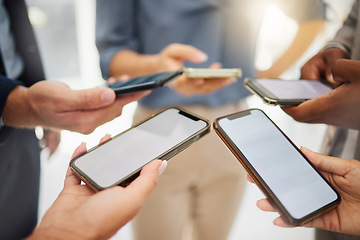 Image showing Group, business people and blank phone screen for mockup space, mobile app and multimedia networking. Closeup hands of employees with smartphone technology, digital download and team sharing UI data