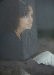 Image showing Sad, rain and thinking with woman by window for depression, tired and lonely. Anxiety, mental health and exhausted with female contemplating at home for broken heart, disappointed and fear mockup