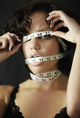 Image showing Anorexia, measuring tape and cover with face of woman for eating disorder, weight loss and fear. Diet, frustrated and mental health with female for anxiety, stress and bulimia problem or issue