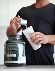 Image showing Man, hands and preparing whey protein shake for nutrition, muscle gain or body mass supplement. Hand of male bodybuilder making pre workout or powder drink product for exercise, diet or healthy meal