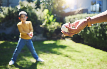 Image showing Hand, baseball and person playing with child on bokeh or .parent and kid on grass field for training. Softball game, outdoor sport and hand ready for throw or pitch to young athlete on sunny day.