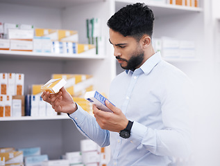 Image showing Pharmacy, medicine and man with pills reading label for medication, prescription and treatment. Healthcare clinic, drug store and male person with box for medical product, supplements and antibiotics