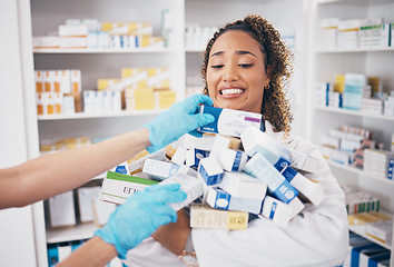 Image showing Pills, stock stress and woman pharmacist with medicine box, retail and supplements in a pharmacy with chaos. Healthcare, wellness and shop worker doing inventory for medication sales with anxiety