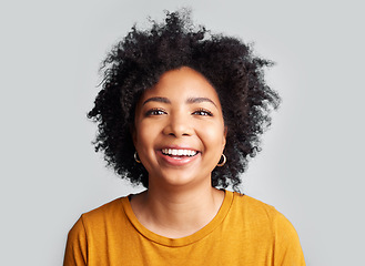 Image showing Smile, woman and portrait in studio, white background and confident on backdrop. Face of happy young female model laughing with curly afro hair, positive personality and gen z style from South Africa