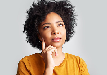 Image showing Face, serious woman and thinking of ideas in studio, white background or questions to remember. Focused female model think of solution, decision and future choice, daydream emoji or visionary mindset