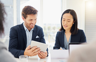 Image showing Business people, meeting conversation and tablet ideas together in an office. Asian woman employee reading a report review with a businessman while talking and planning a company strategy with data