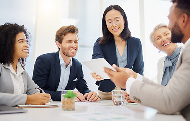 Image showing Collaboration, discussion and business people with a tablet in a meeting in office planning a corporate proposal. Professional, tech and team working on company project together in the workplace.