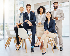 Image showing Success, happy and portrait of business people on chair in office with confidence, pride and motivation. Teamwork, diversity and group of men and women smile for goals, company mission and happiness