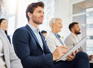 Image showing Audience, notebook and happy man writing notes of tradeshow speech, seminar presentation or convention event. Trade show attention, conference meeting or business crowd listening in training workshop