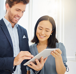 Image showing Business people, conversation and tablet research together in an office. Asian woman employee reading a report review with a businessman while talking and planning a company strategy with data