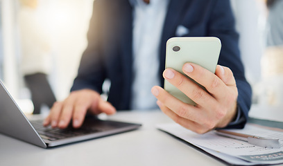 Image showing Phone, closeup and laptop with hands of man in office for research, planning and networking. Technology, digital and communication with male employee for contact, online connection and email