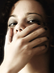 Image showing Hands on the mouth, portrait and woman with anxiety, secret and abuse with trauma, mental health and silence. Face covered, female person or model with pain, awareness or victim with fear and problem