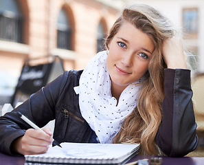 Image showing Creative, portrait and student drawing in the city on a notepad for an art college assignment. Happy, smile and young female artist sketching a picture in a book for university project in urban town.