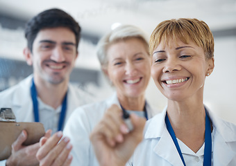 Image showing Doctor, happy team and writing healthcare strategy for schedule planning or brainstorming together at hospital. Group of doctors smile in meeting, collaboration or teamwork for medical tasks or plan