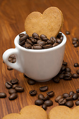 Image showing Three Gingerbread Cookies in Coffee Beans