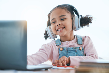 Image showing Computer, headphones and child listening in virtual class for e learning, language translation or knowledge at home. Happy kid on audio technology, laptop and online education for English development
