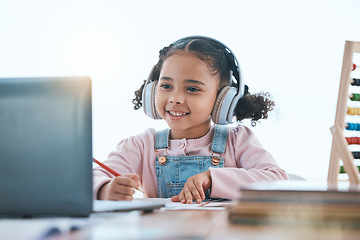 Image showing Online education, laptop and headphones of child in e learning, language translation and writing in virtual class. Happy kid with audio technology, computer and English development or numbers at home