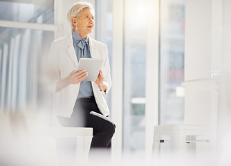 Image showing Elderly business woman, tablet and thinking of company growth statistics, customer experience review or online data. Vision, office work and confident female person, director or boss sitting on desk