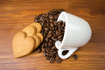 Image showing Three Gingerbread Cookie Hearts in Coffee Beans