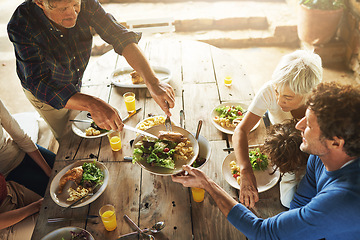 Image showing Food, party and share with family at lunch from above for health, bonding and celebration. Vacation, social and event with parents and children eating together for dining, generations and wellness