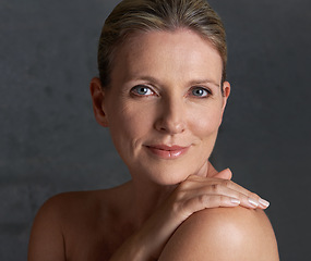 Image showing Portrait, skincare and senior woman with cosmetics, beauty and dermatology against studio background. Face, mature female person and old lady with salon treatment, hygiene and grooming with soft skin