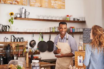 Image showing Barista, counter and woman with order at cafe with smile, notes and service for good customer experience. Waiter, writing and lady with choice, decision or pick from menu in restaurant, deli or diner