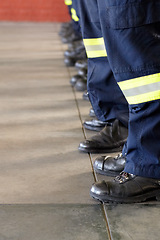 Image showing Fireman service, legs and team of firefighter ready for emergency services, disaster prevention or fire fighting. Shoes, safety security and row of people, men or firemen group standing at attention