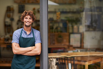 Image showing Welcome, arms crossed and portrait of man at restaurant for small business, coffee shop and waiter. Entrepreneur, happy and smile with male barista at front door of cafe for diner and food industry