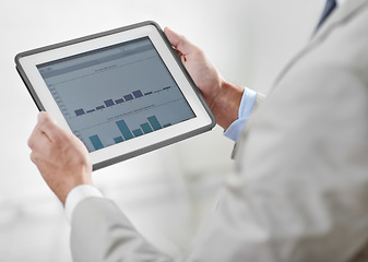 Image showing Closeup, business and man with a tablet, screen and finance planning with charts, budget and investment. Male person, accountant and employee with profit growth, analysis and technology at the office