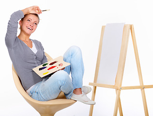 Image showing Woman, painting and happy with art canvas in studio for creativity and talent with paint brush for color. Female artist or painter isolated on a white background for creative work and mockup idea