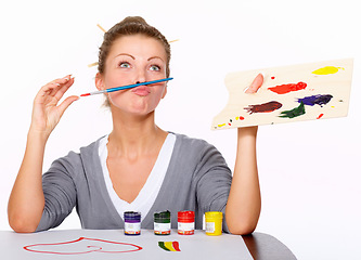 Image showing Silly woman, painting and art in studio for creativity and talent with paint brush for color. Female artist or painter with funny moustache isolated on a white background for creative drawing