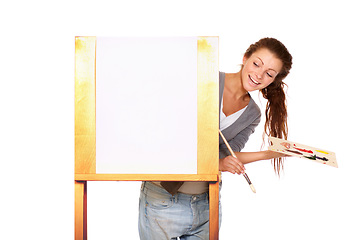 Image showing Canvas, woman painter and art in studio for creativity and talent with paint and a brush for color. Happy female artist isolated on a white background for creative painting, project and mockup space