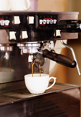 Image showing Pouring coffee, mug and machine in cafe for espresso, latte beverage or hot drink. Restaurant, electrical appliance and caffeine cup for making or brewing cappuccino in retail shop or small business.