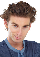 Image showing Flirt, smirk and portrait of a man in a studio with a confident smooth flirting personality. Confidence, casual and closeup face of a young and handsome male model isolated by a white background.