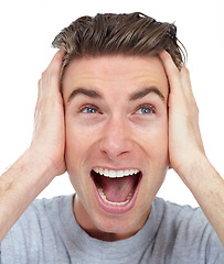 Image showing Excited, face and man closeup in a studio with happiness from deal and announcement with smile. Isolated, white background and male person happy and shouting from good news, winning and surprise