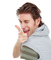 Image showing Pointing, wink and portrait of man in studio for finger gun, approval and choice. Confident, happy and smile with male and hand gesture isolated on white background for success, yes and thank you