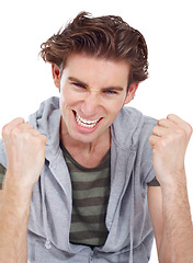 Image showing Yes, excited and portrait of a man with success and fist in a studio with happiness from winning. Isolated, white background and male model face happy about winner celebration with a smile and win