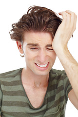 Image showing Headache, stress and pain with man in studio for worry, anxiety and suffering. Migraine, depression and mental health with male model isolated on white background for pressure, frustrated and tired