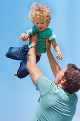 Image showing Happy, throwing and blue sky with father and son for playful, bonding and parenting. Smile, summer and affectionate with man and young boy playing for happiness, trust and free time on weekend