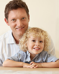 Image showing Happy family, love and portrait of father with smiling son at their home. Happiness or quality time, bonding or togetherness and wellness of parent with young child enjoying indoor fun in living room