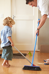 Image showing Father with boy kid sweep up mess, family cleaning together and help with broom and dustpan. Hygiene, chores and house work with man and kid bonding, working together and helping with dirt on floor