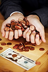 Image showing Cupped hands, coins and saving cash for investing, planning and personal finance goal in office. Financial advisor, holding money or currency for banking, investment or building wealth at workplace