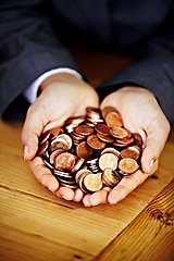 Image showing Cupped hands, coins and saving money for investing, planning and personal finance goal in office. Financial advisor, holding cash or currency for banking, investment or building wealth at workplace