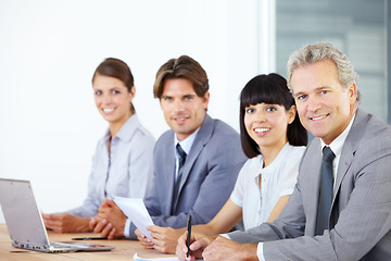 Image showing Portrait, collaboration and a team of business people sitting in the boardroom for a planning meeting. Teamwork, strategy or training with corporate men and women working together in the office