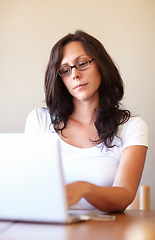 Image showing Woman, reading and typing on laptop in home office for remote work, entrepreneurship or online business. Businesswoman, entrepreneur and computer for research, email communication or social network