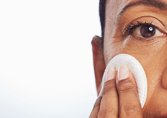 Image showing Portrait, mockup or woman with cotton pad for facial dermatology, skincare or healthy shine. White background, studio space or face of person cleaning with swab for beauty, cleansing or dirt removal