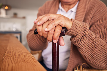 Image showing Closeup, hands and cane of person with disability, arthritis and aid of osteoporosis, parkinson or stroke. Retirement, senior patient and holding walking stick of support, help or healthcare mobility