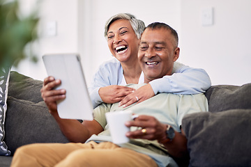 Image showing Home, tablet or senior couple laughing, happy and reading funny email, news article joke or social media meme. Website comic, comedy blog or elderly man, old woman or people smile on living room sofa