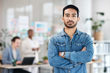 Image showing Portrait, arms crossed and man in office with leadership, opportunity and startup business. Serious project manager, pride and face of young businessman with confidence in professional workshop space